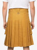 Mustard yellow pleated skirt worn with a white top on a plain background