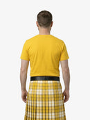 Man wearing a yellow t-shirt and plaid kilt on a white background