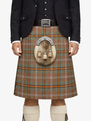 Person wearing a traditional Scottish kilt with a visible sporran on a white background
