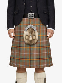 Person wearing a traditional Scottish kilt with a visible sporran on a white background