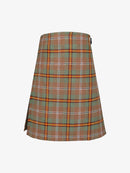 Plaid kilt with green, orange, and white pattern on a white background